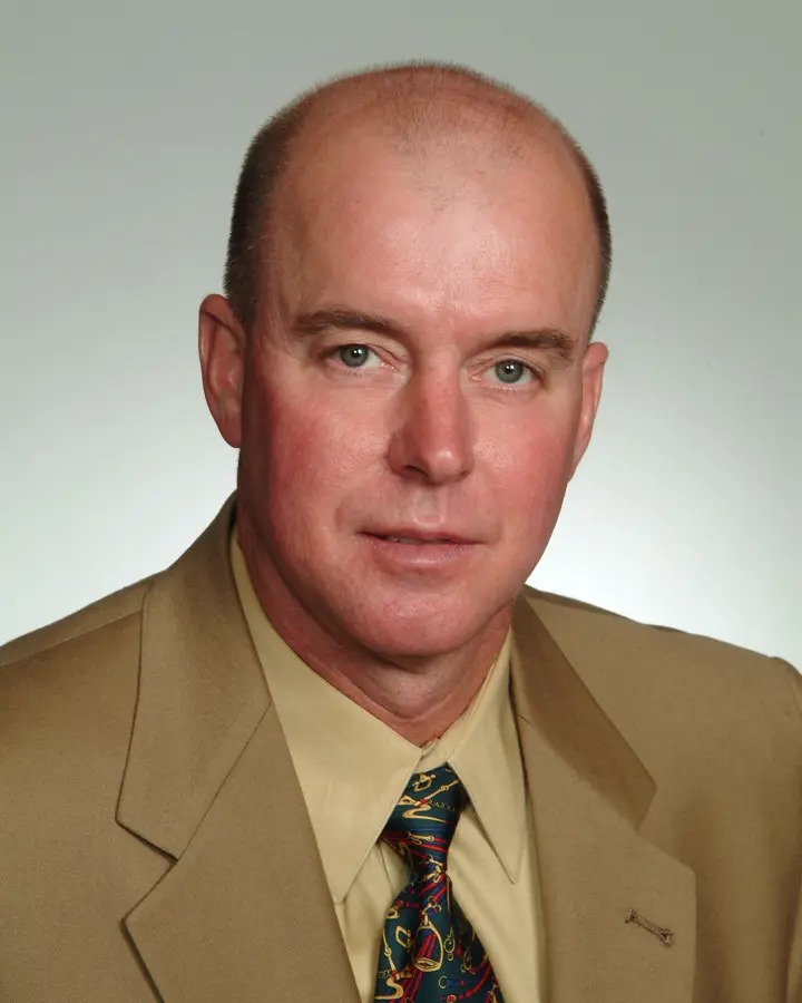 Gregory D. “Greg” Elliott